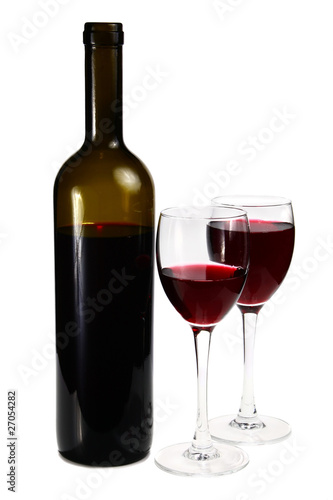 bottle with red wine and glass