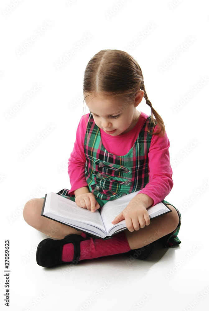 Preschool girl reading