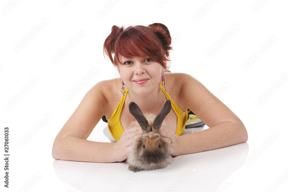 beautiful girl with a rabbit . On a white background. beautiful girl with a rabbit . On a white background.