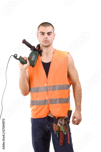 young man whit drillmachine