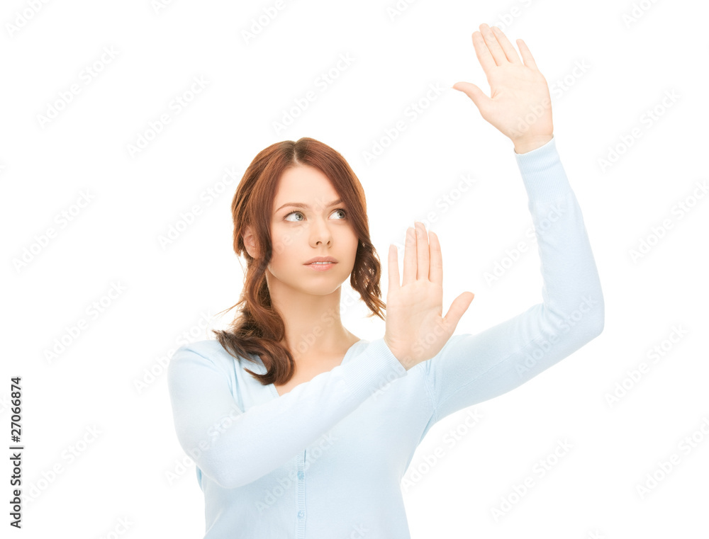 businesswoman working with something imaginary businesswoman working with something imaginary