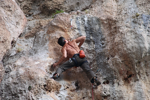 Rock climber on the cliff