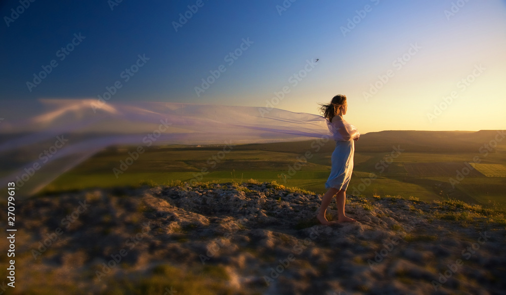 girl in the hill. sunset girl in the hill. sunset