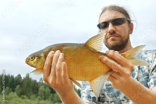 Fisherman and a fish