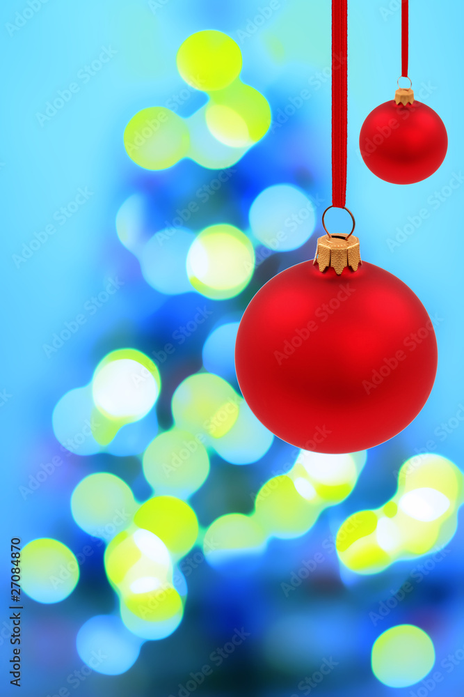 Fototapeta premium Red glass ball and magic blur christmas tree