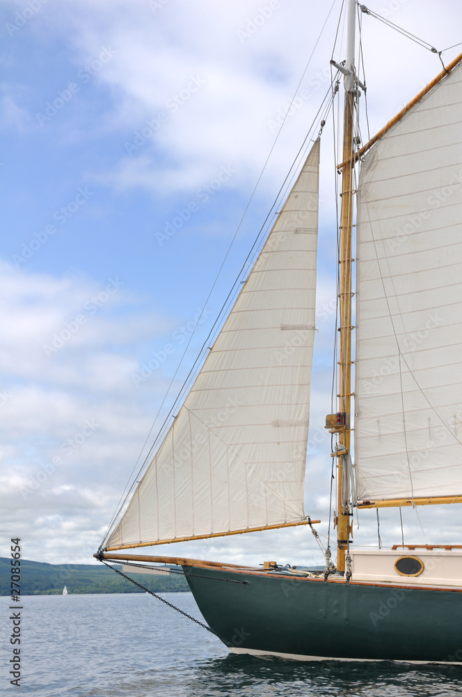 Fototapeta premium Jib, Foresail, and Wooden Mast of Schooner Sailboat