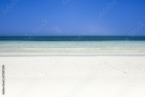 clear sea, white sand and blue sky, carribean paradise, lot of c