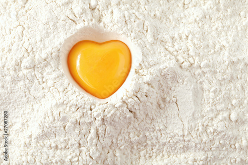 love to bake it!  egg  yolk on flour, full frame