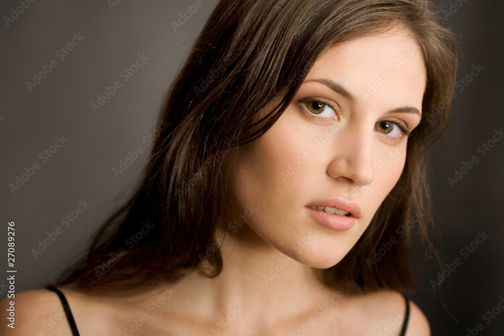 Obraz premium Black hair young woman portrait, Studio shot
