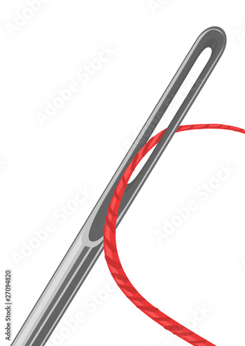 Needle eye with the passed red thread through