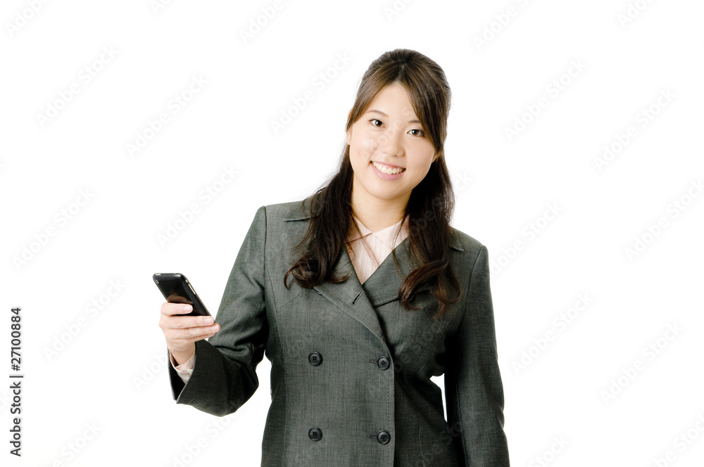 メールする女性社員 メールする女性社員