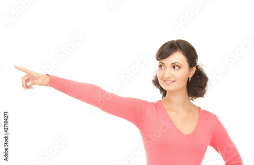 attractive businesswoman pointing her finger