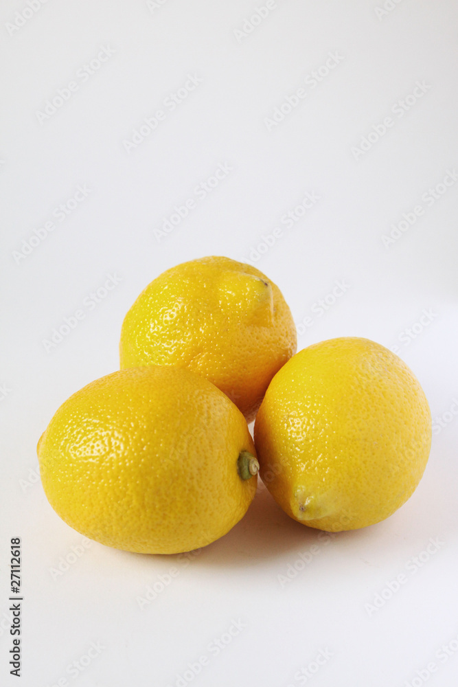 three lemons on white background three lemons on white background