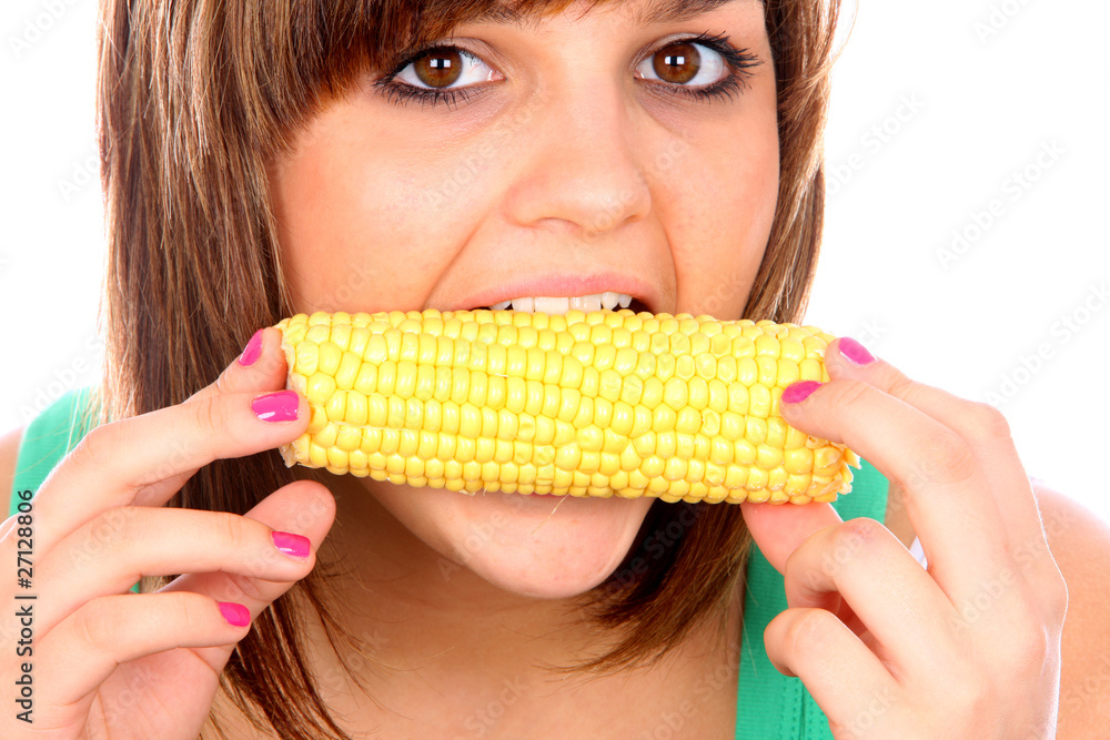 Young Woman Eating Corn on The Cob. Model Released Young Woman Eating Corn on The Cob. Model Released