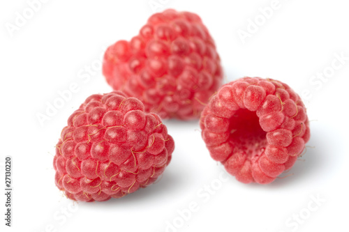 fresh raspberries on the white