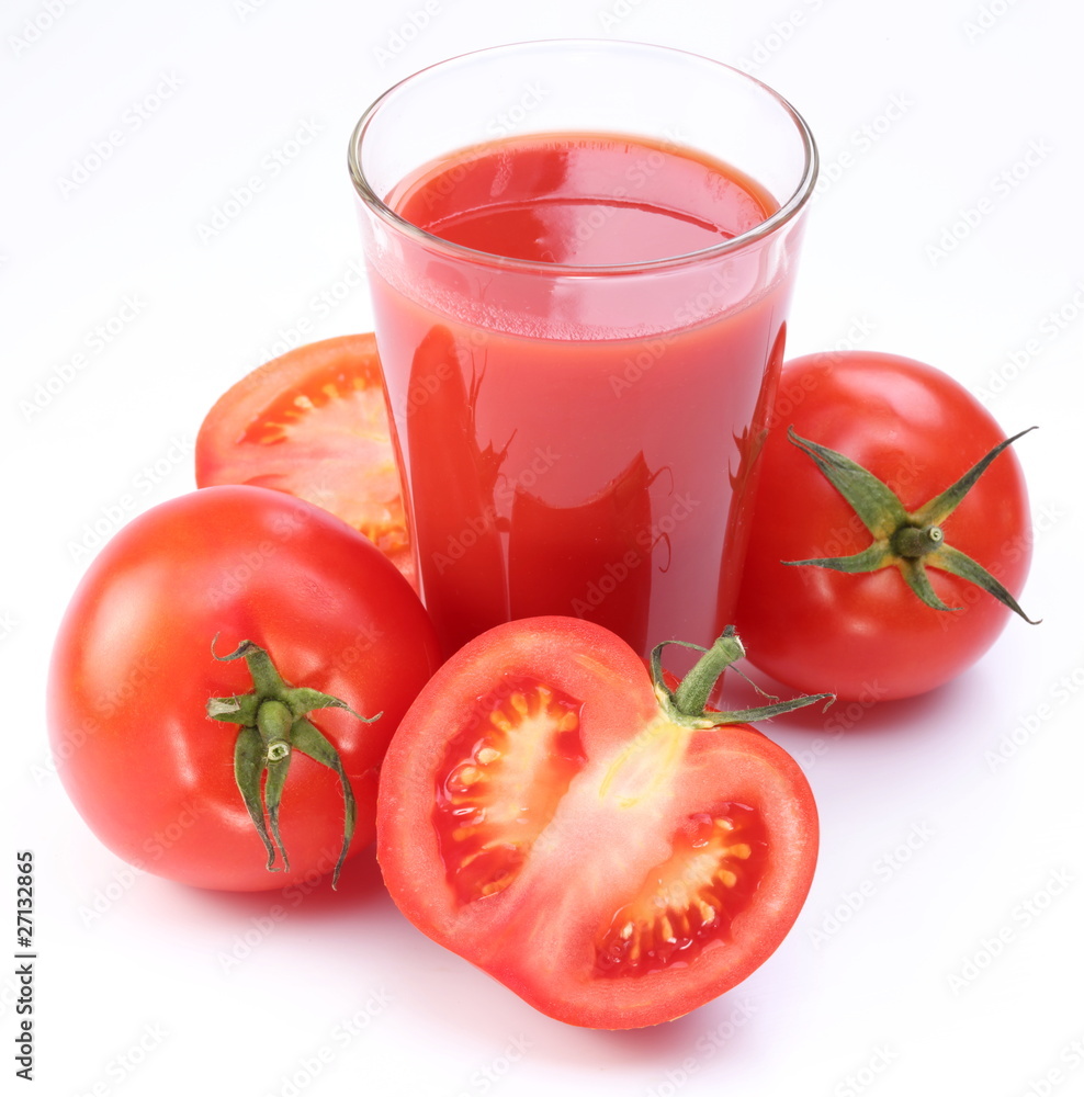 Fresh tomato juice and ripe tomatoes round glass. Fresh tomato juice and ripe tomatoes round glass.