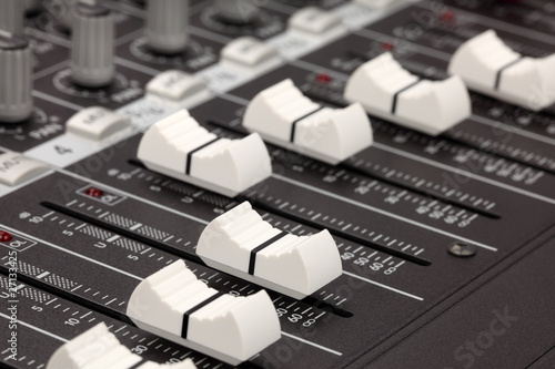 closeup of audio mixing console photo