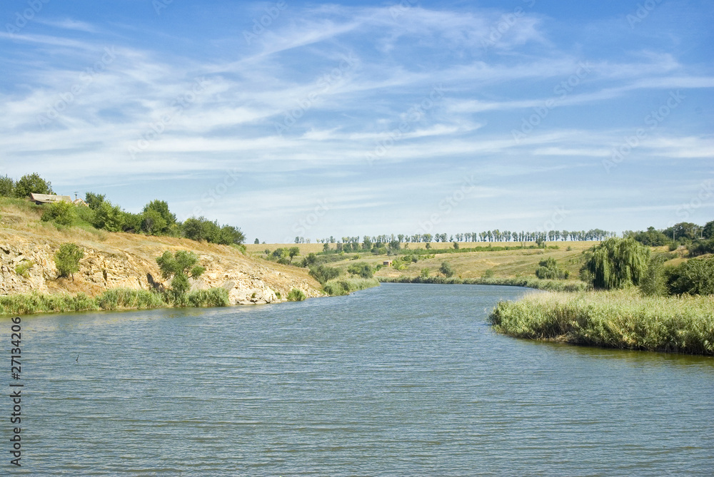 Ukrainian rural landscape with twisting river.