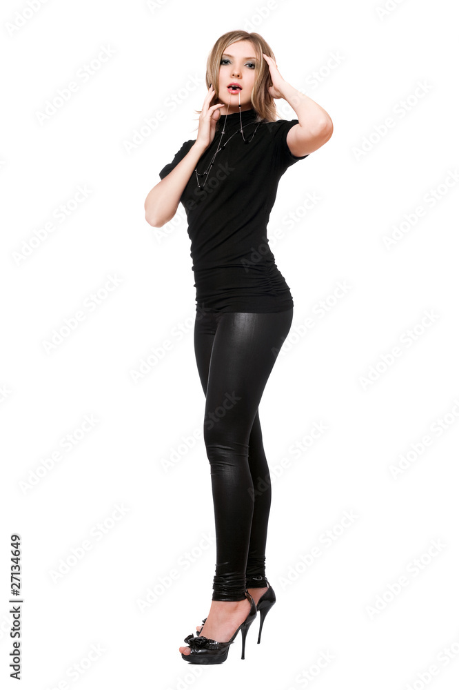 Beautiful young woman in leggings. Isolated Beautiful young woman in leggings. Isolated