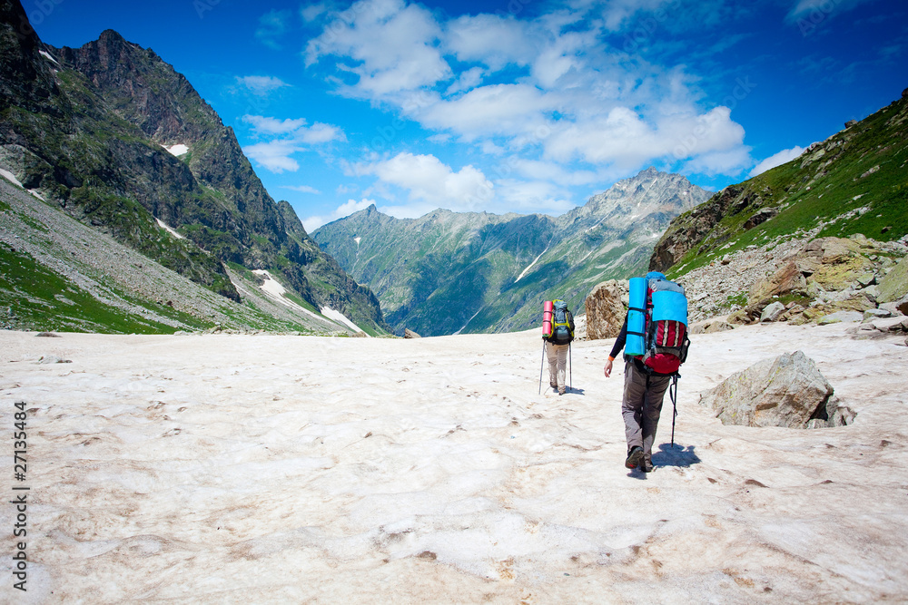 Fototapeta premium Hikers in Caucasus mountains