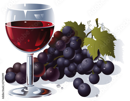 Verre de vin rouge et grappe de raisin noir