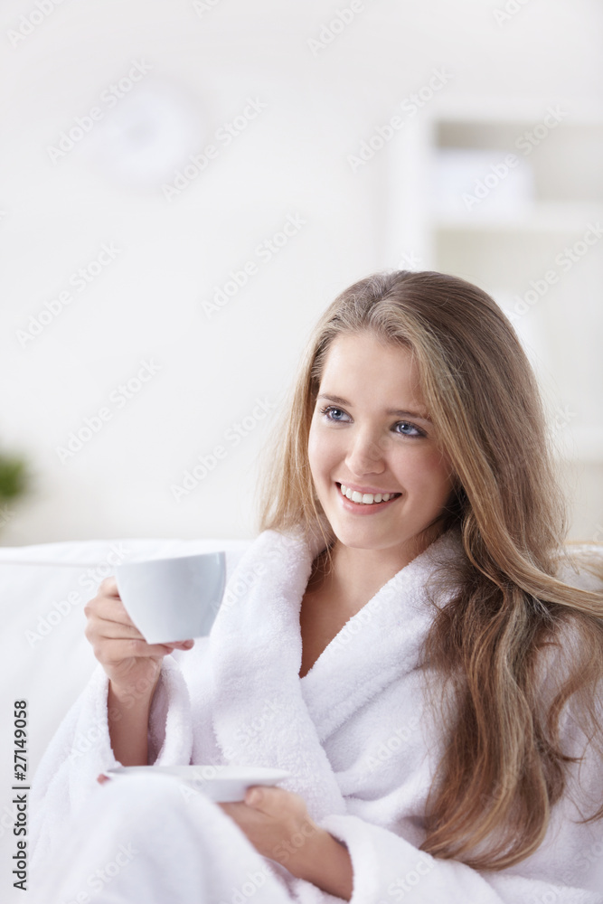 Beautiful girl drinking coffee at home Beautiful girl drinking coffee at home
