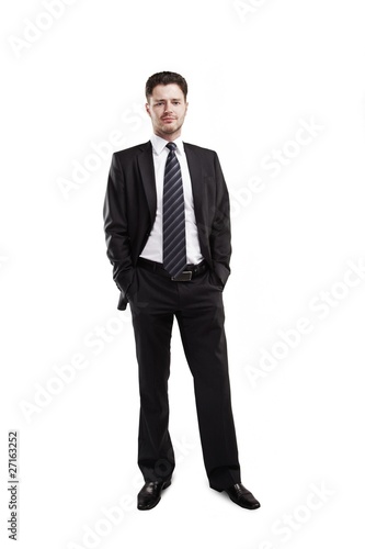 portrait of a young businessman standing