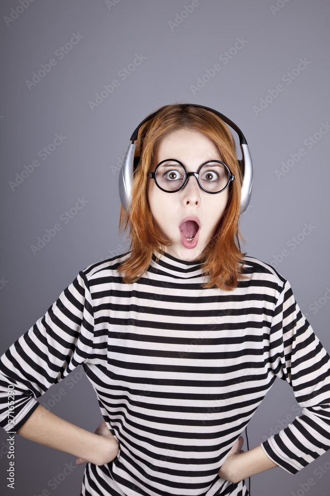 Funny girl with headphone and glasses. Funny girl with headphone and glasses.