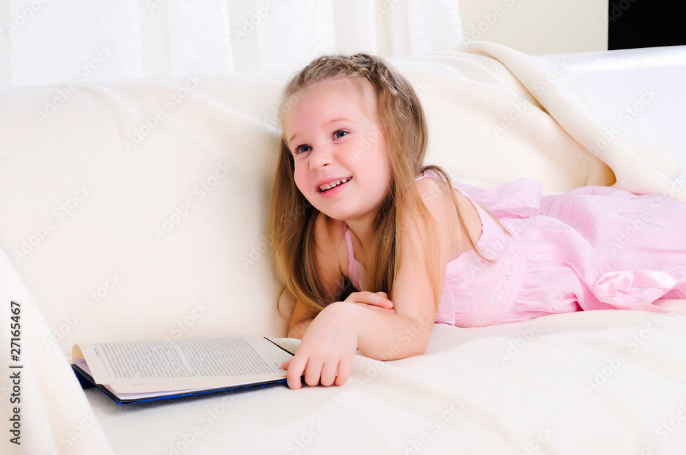 Little girl lying on the couch Little girl lying on the couch