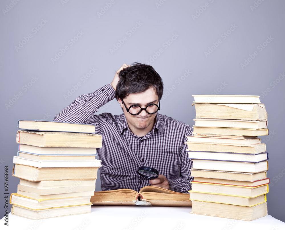 The young student with the books isolated.