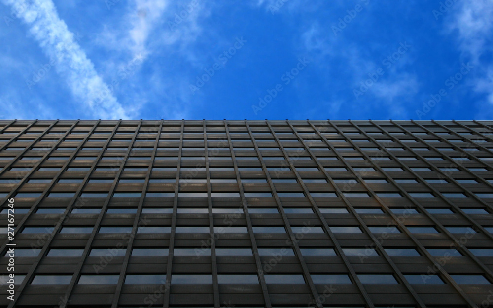 Side of a block of offices with blue sky Side of a block of offices with blue sky