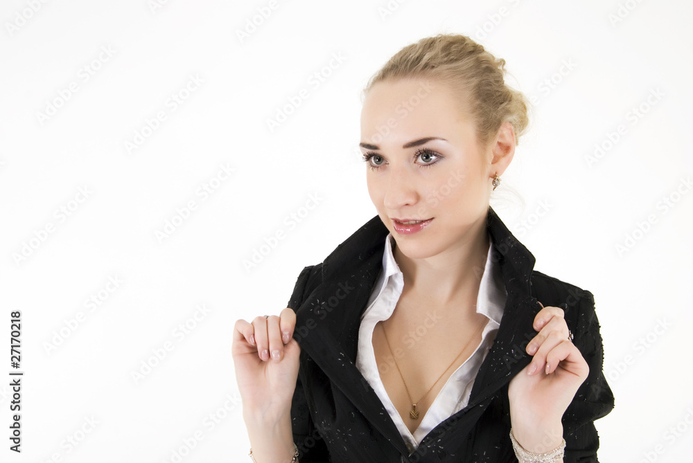 Portrait of a young girl holding the collar of her jacket Portrait of a young girl holding the collar of her jacket