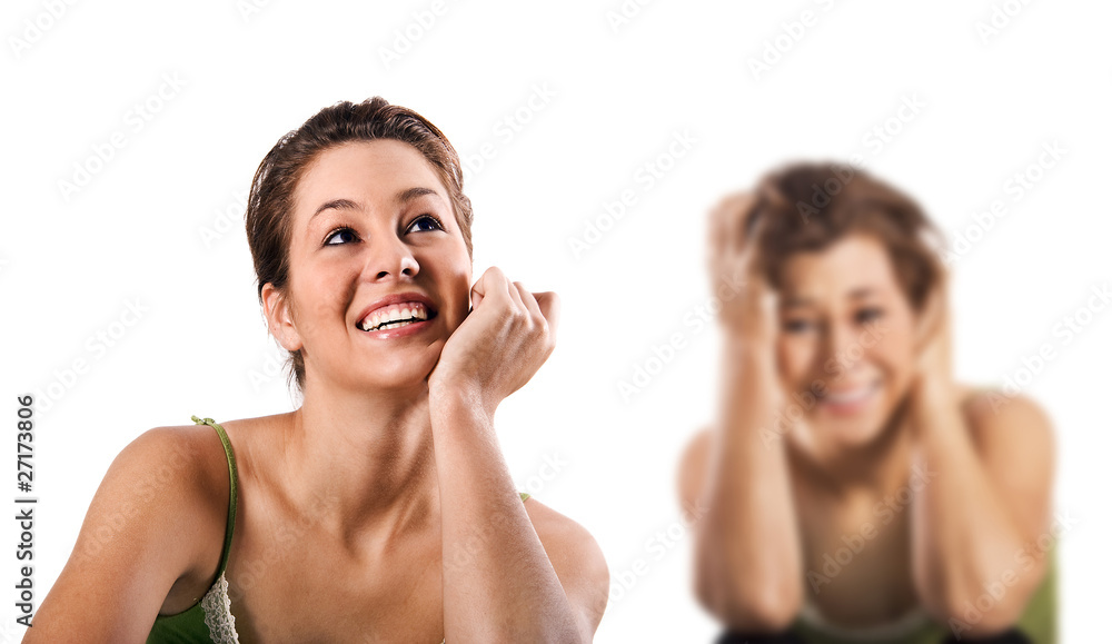 Contradiction - a happy smiling and a unhappy depressed woman Contradiction - a happy smiling and a unhappy depressed woman
