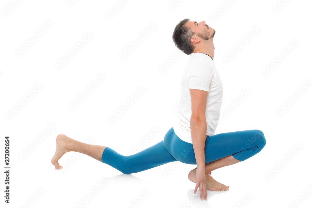 young man practising yoga postures combination suri namaskar. is young man practising yoga postures combination suri namaskar. is