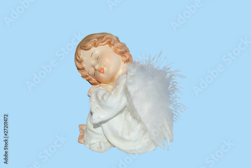 Angel doll  with wings on BLUE  background