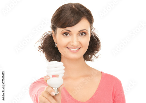 woman holding energy saving bulb