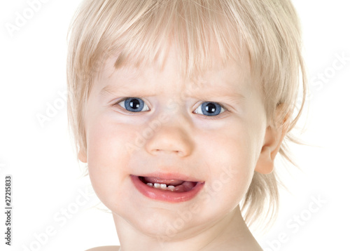 portrait of disaffected baby isolated on white.