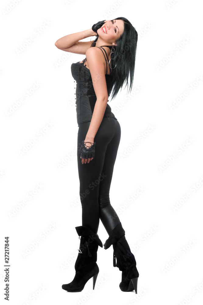 Smiling brunette in black leggings. Isolated Smiling brunette in black leggings. Isolated