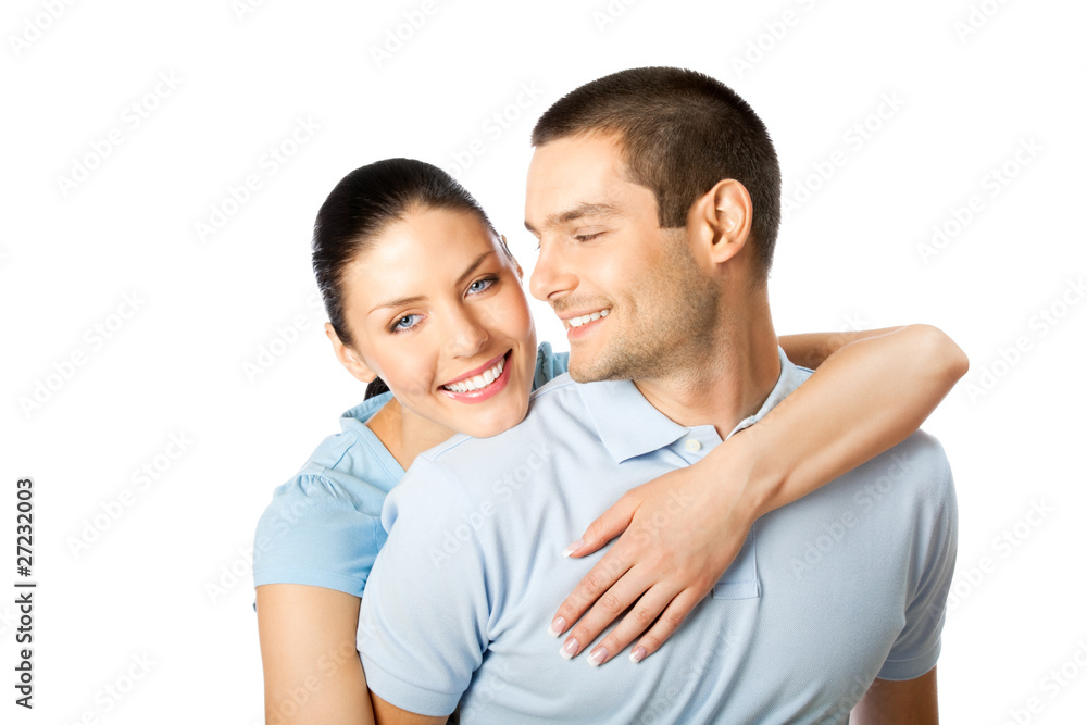 Portrait of young happy smiling attractive couple, isolated on w Portrait of young happy smiling attractive couple, isolated on w