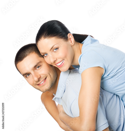 Portrait of young happy smiling attractive couple, isolated