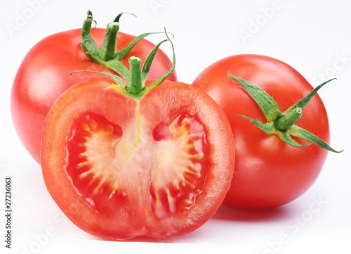 Group of ripe tomatoes and its half