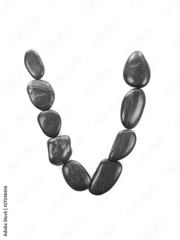 Letter 'V' made of stones isolated on white Letter 'V' made of stones isolated on white