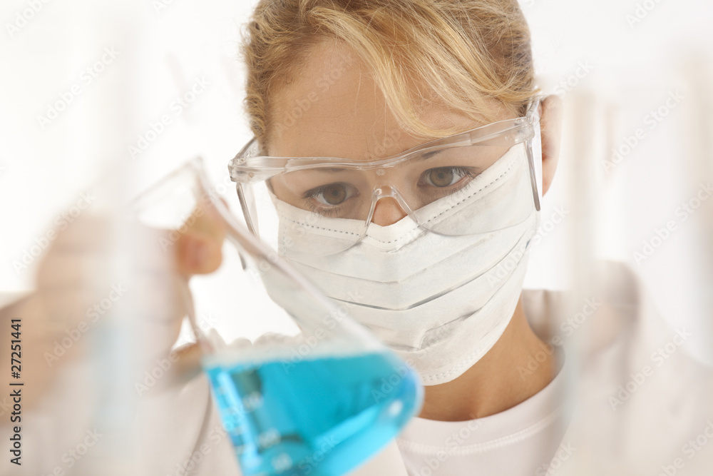 Close-up of scientist holding beaker Close-up of scientist holding beaker