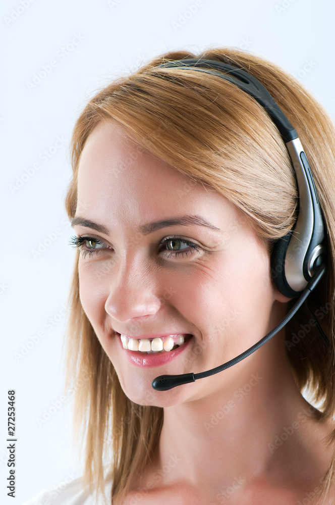 Young call center operator with the headset Young call center operator with the headset