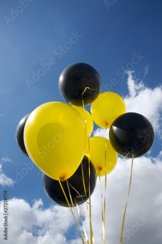 Black and yellow balloons
