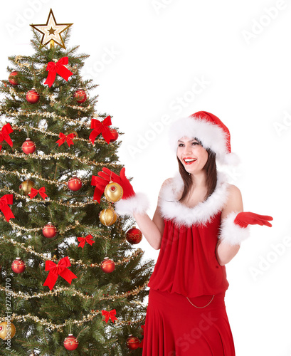 Christmas girl in santa holding gift box.  Isolated.