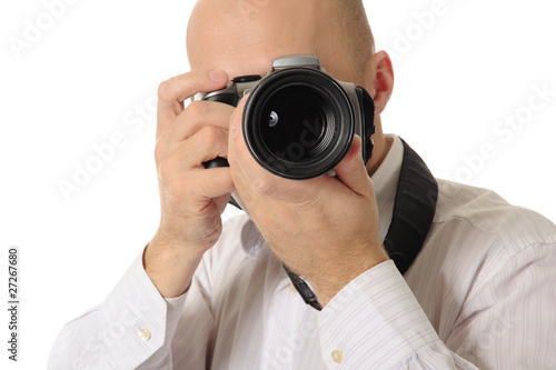 man holds a camera