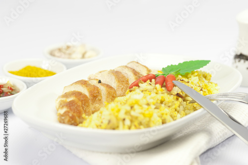 chicken breast fillet with cury rice photo