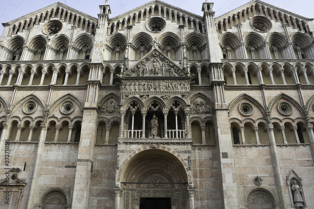Facade of the Romanesque Cathedral in Ferrara, Italy