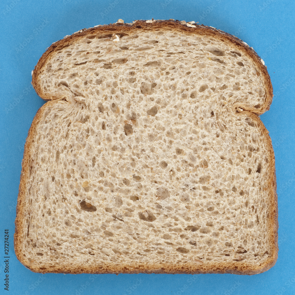 Slice of Whole Grain Bread on Vibrant Blue